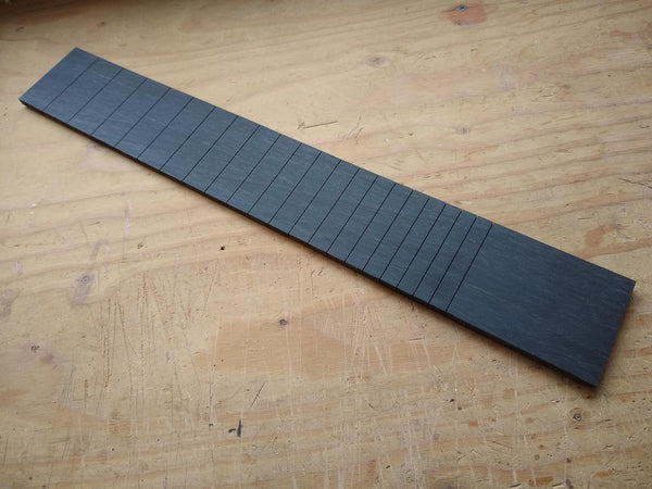 Slotted fretboard store